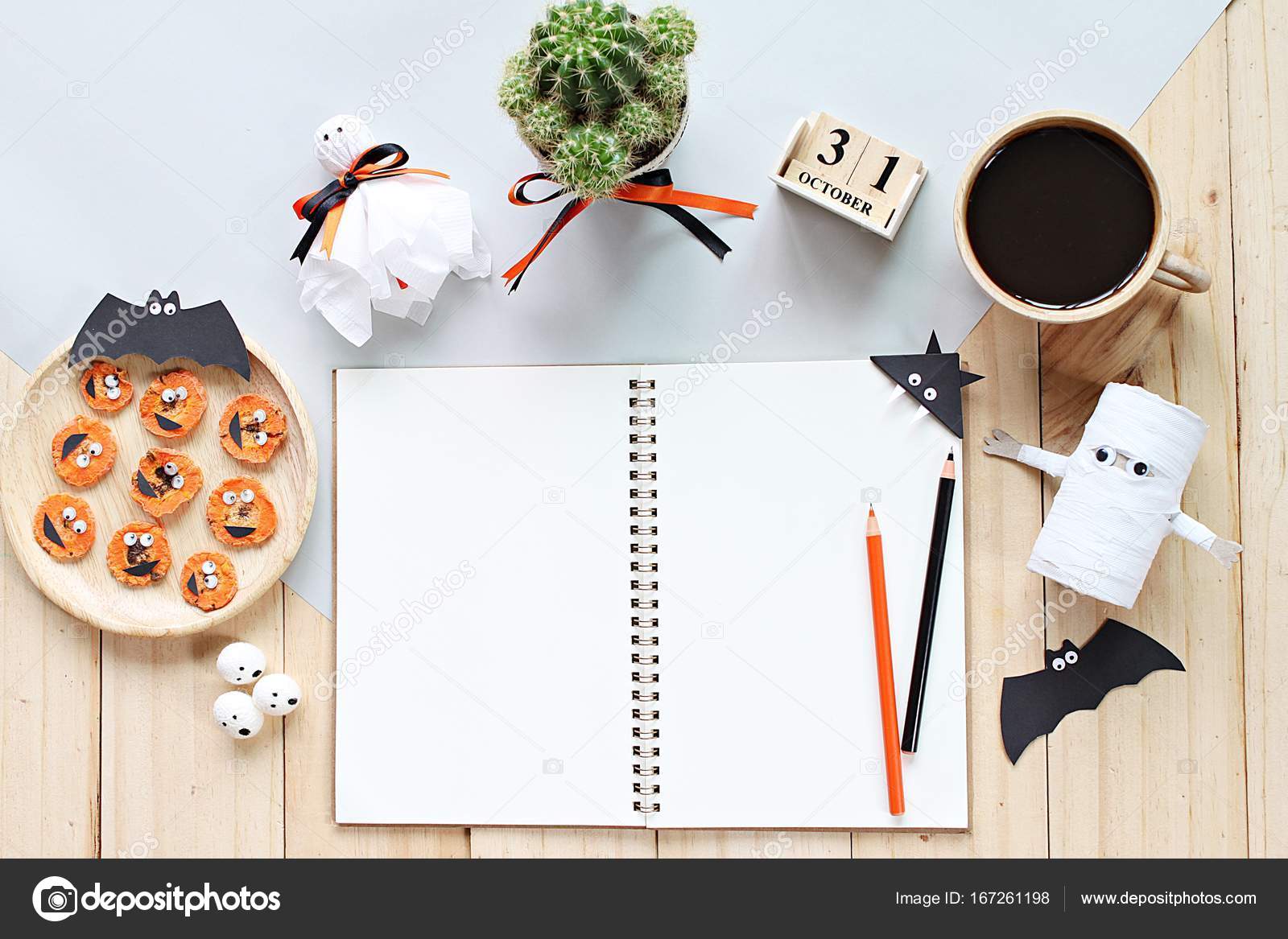 Download Mock Up Of Open Notebook Paper Crafts Cube Calendar Grilled Carrots With Scary Face And Coffee Cup Stock Photo Image By C Sureeporn 167261198