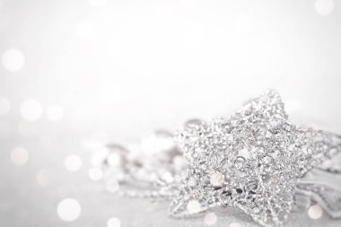 Yıldız ve parlak arka plan bokeh parlak gümüş süs