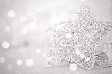 Parlak arka plan bokeh parlak Gümüş Yıldız süsler