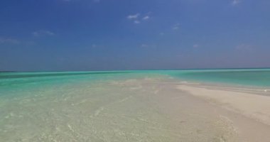 Coastal area with clear shallow water. Enjoying nature of Bali, Indonesia. 