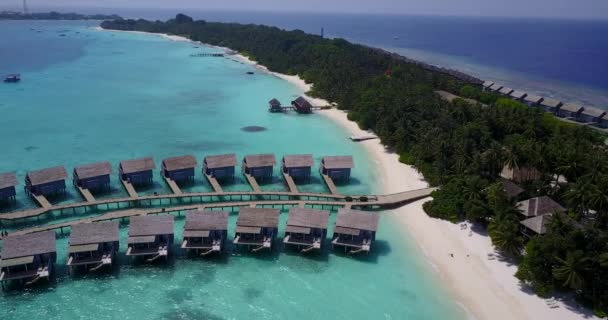 Cozy bungalows of tropical island. Exotic journey to Maldives. — Stock Footage Cozy Bungalows Tropical Island Exotic Journey Maldives Stock Video
