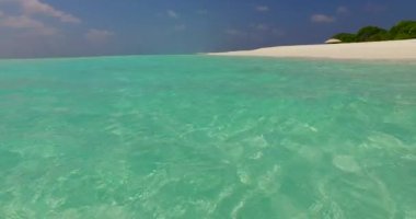 Coastal area with clear shallow water. Enjoying nature of Bali, Indonesia. 