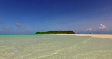 Seashore with shallow water. Journey to Gili Trawangan, Thailand.