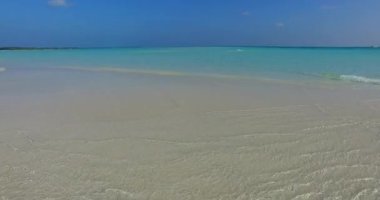 Shallow sea water at the coast. Journey to Gili Trawangan, Thailand.