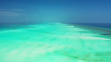 Seashore with shallow water. Journey to Gili Trawangan, Thailand.