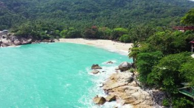 Vibrant turquoise sea edging tropical island. Enjoying nature of Dominican Republic, Caribbean.   