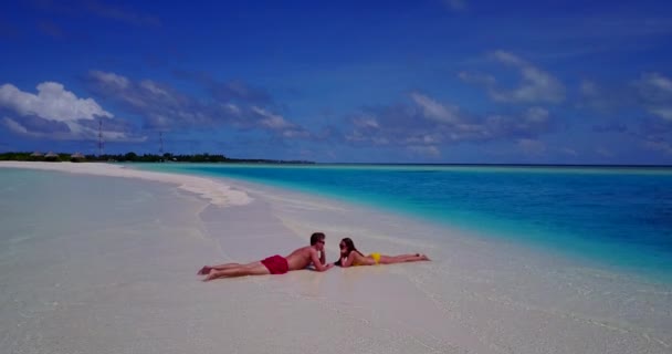 Young Man Woman Lay Sea Coast Sunbathing Beautiful Couple Resting — Stock Video