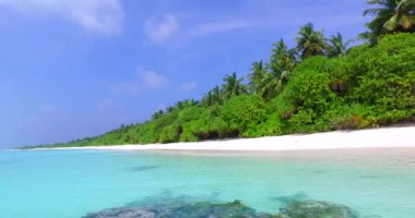 Vibrant turquoise sea edging tropical island. Enjoying nature of Dominican Republic, Caribbean.   
