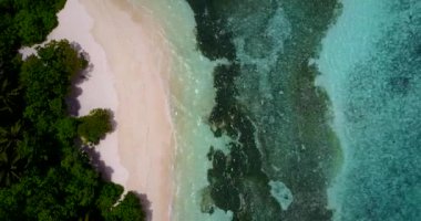 Empty coast during sunny morning. Enjoying nature of Bali, Indonesia. 