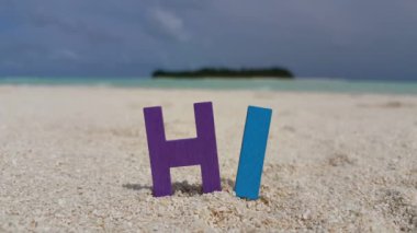 Colored text from blocks on the beach. Enjoying nature of Dominican Republic, Caribbean.   