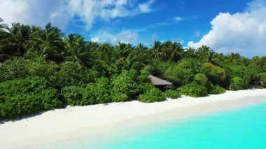 Tropical island in bright turquoise sea. Enjoying nature of Bali, Indonesia. 
