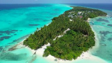 Tropical island in bright turquoise sea. Enjoying nature of Bali, Indonesia. 