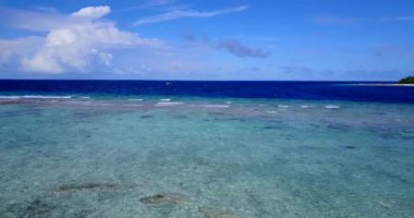Coastal area with clear shallow water. Enjoying nature of Bali, Indonesia. 