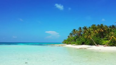 Vibrant turquoise sea edging tropical island. Enjoying nature of Dominican Republic, Caribbean.   