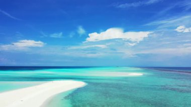 Coastal area with clear shallow water. Enjoying nature of Bali, Indonesia. 