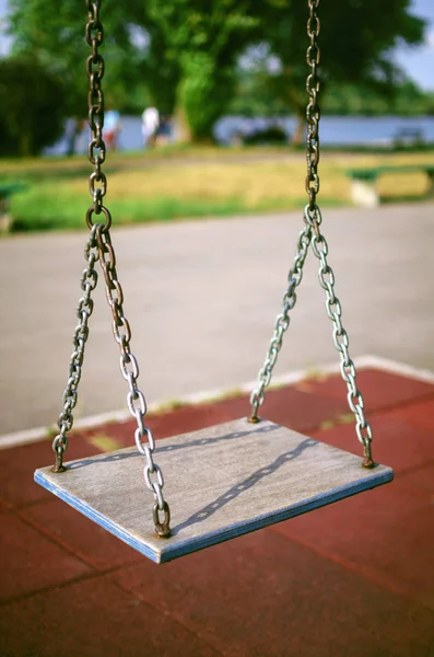 Old swing on playground — Stock Photo, Image