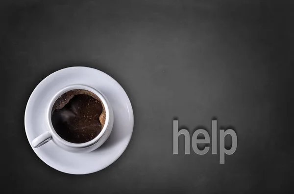 Βοήθεια λέξη σε μαυροπίνακα με φλιτζάνι καφέ — Φωτογραφία Αρχείου