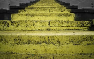 Grunge yellow concrete stairs on stadium clipart