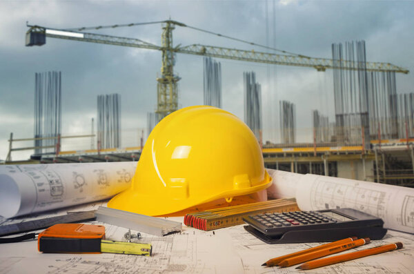 Yellow construction helmet, building and industry