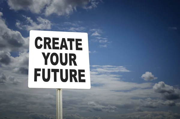 Crea tu futuro escrito en la señal de tráfico con fondo azul del cielo — Foto de Stock