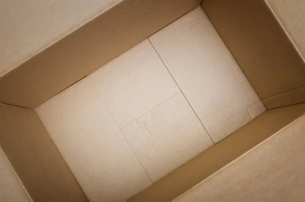 Empty cardboard box - selective focus on the bottom of the box