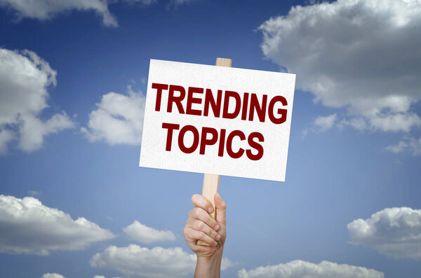 Плакат "Тенденции" на фоне неба
