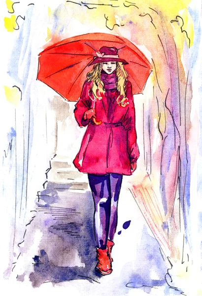 Piękna kobieta w czerwonym chodzenie w deszczowy dzień w parku z parasolem — Zdjęcie stockowe
