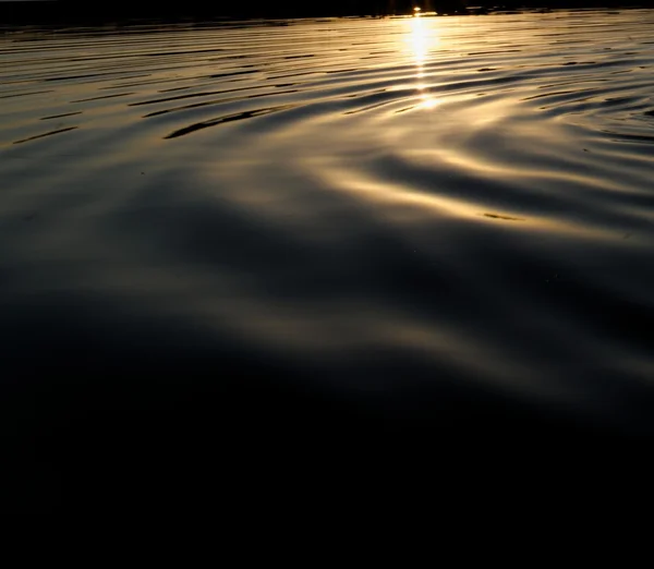 Golden lake waves — Stock Photo, Image