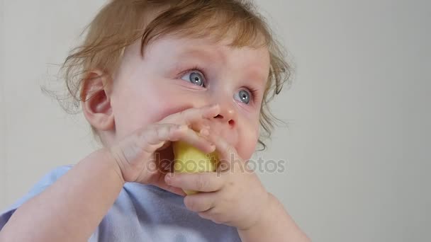 Cute Little Boy Eating Apple — Stock Video