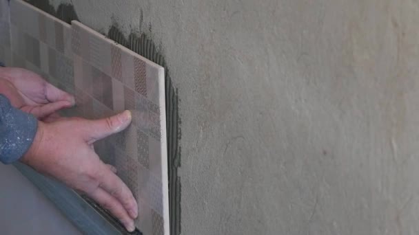 Worker Putting Ceramist Tile On The Wall — Stock Video