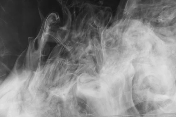 Beautiful storm cloud isolated on black background. Smoke from cigarettes. Vape. — Stock Photo, Image