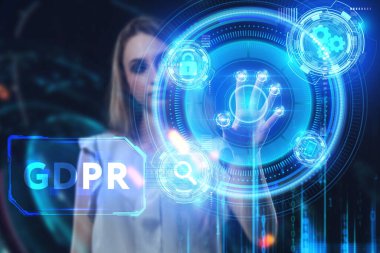 İş, Teknoloji, İnternet ve ağ konsepti. Genç işadamı geleceğin sanal ekranı üzerinde çalışıyor ve GDPR yazısını görüyor.