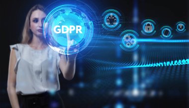 İş, Teknoloji, İnternet ve ağ konsepti. Genç işadamı geleceğin sanal ekranı üzerinde çalışıyor ve GDPR yazısını görüyor.
