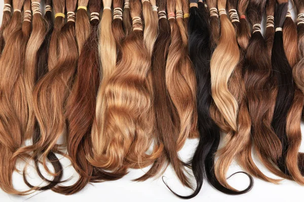 Hair extension equipment of natural hair. hair samples of differ