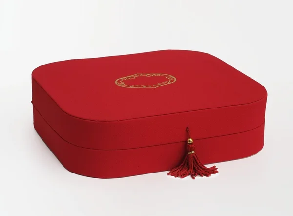 Caixa de um presente com um borla de seda — Fotografia de Stock
