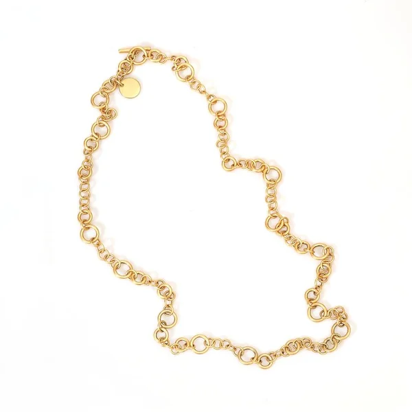 Gold necklace on a white background — Stock Photo, Image