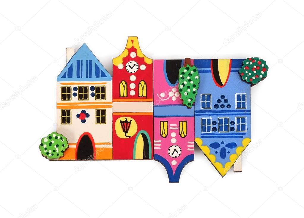 Magnetic souvenir in the form of colored houses