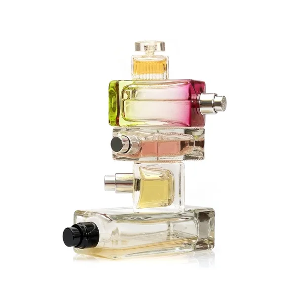 Parfüm şişeleri yığını — Stok fotoğraf