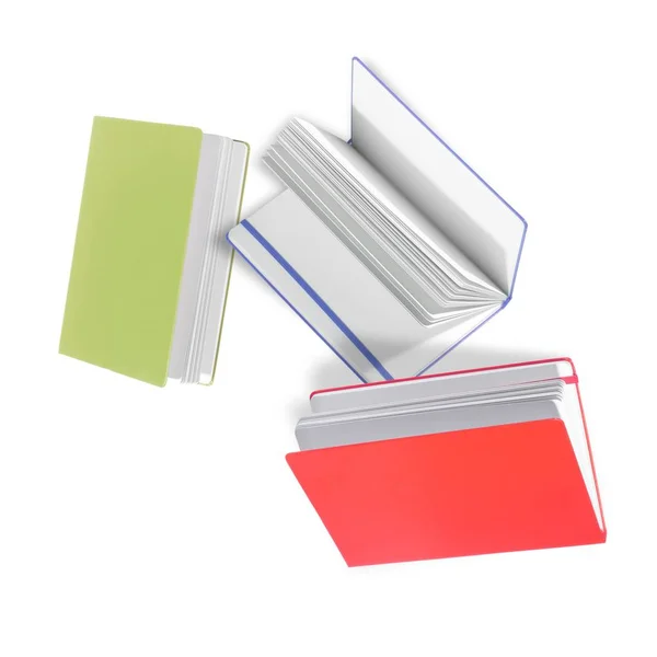 Composition of open, "flying" books on a white background — Stock Photo, Image