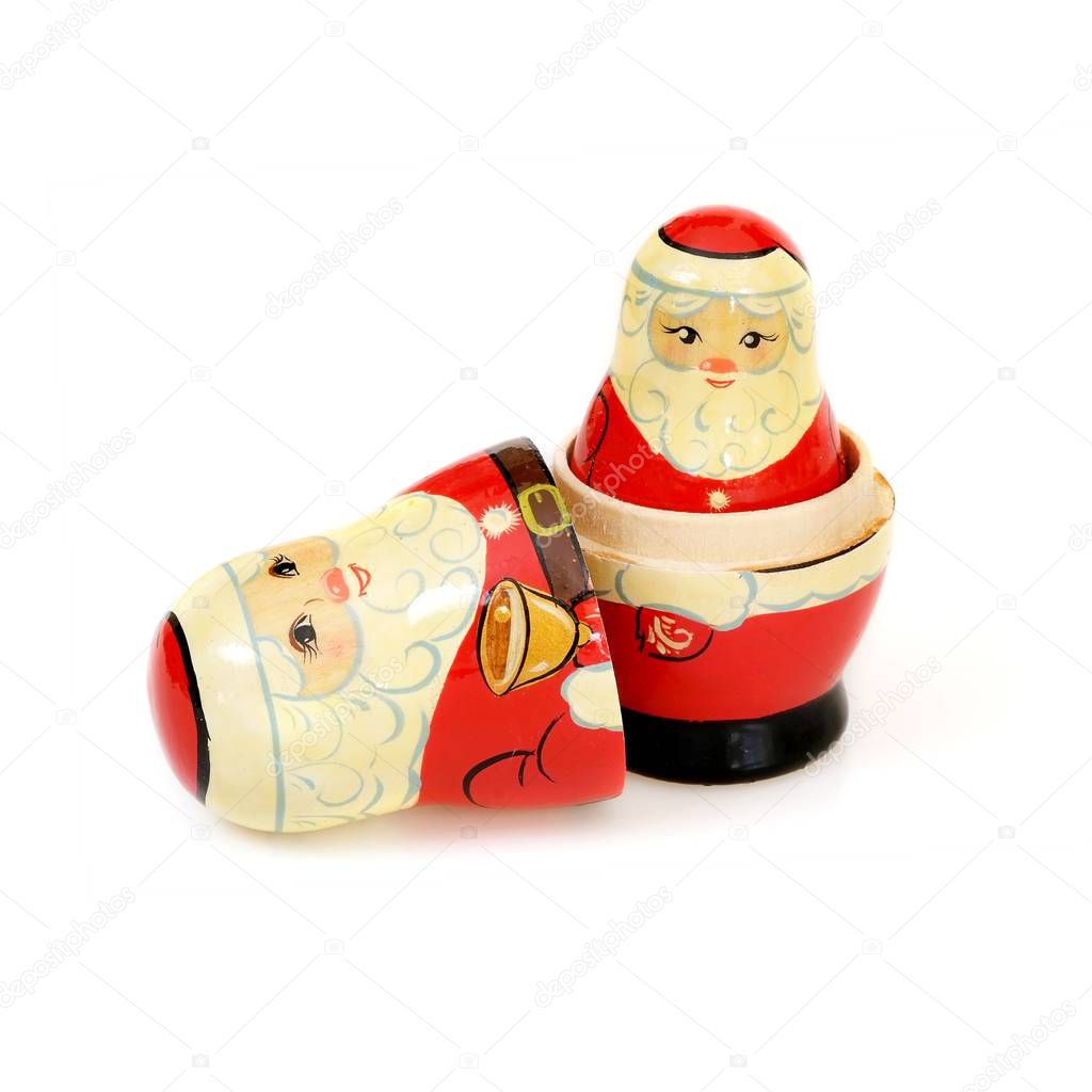 Matryoshka Santa Claus. Christmas hand-painted wooden egg isolated on white background
