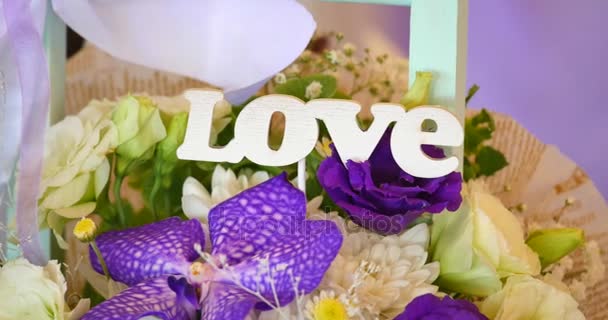 Flower bouquet with word love — Stock Video