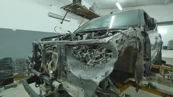 Dismantled car in service station — Stock Video