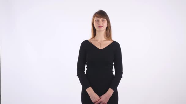 Closeup portrait of young businesswoman looking at camera — Stock Video