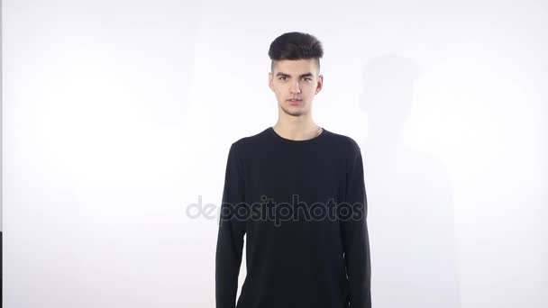Face of the young men on an isolated white background — Stock Video