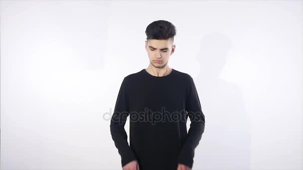 Face of the young men on an isolated white background — Stock Video