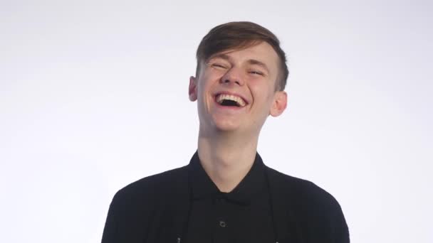 Man laughing out loud against white background — Stock Video