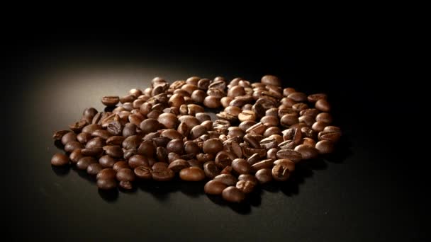 Roasted Coffee Beans Rotate on black background — Stock Video