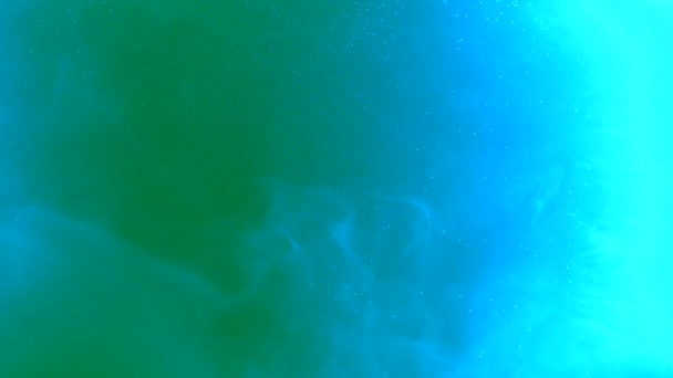 掉进水里的彩色的油墨 — 图库视频影像