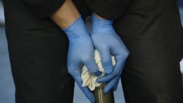 Auto engineer mechanic working on car shock absorber in service workshop — Stock Video