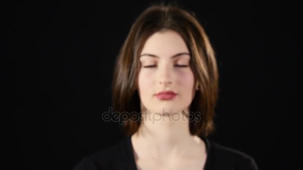 Focus on mobile phone. Young woman hands showing blank smartphone screen isolated on green background and pointing on screen — Stock Video